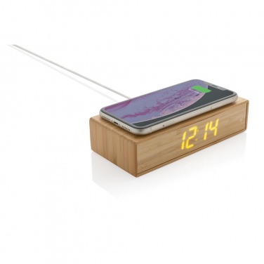 Логотрейд pекламные cувениры картинка: Бамбуковый будильник с беспроводным зарядным устройством, коричневый