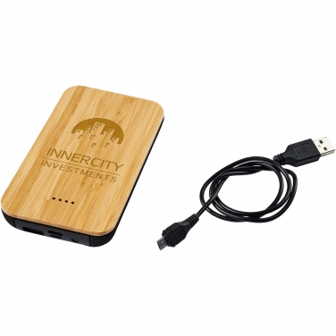 Logotrade profilprodukter bild: Framtida bambu/tyg 6 000 mAh trådlös powerbank